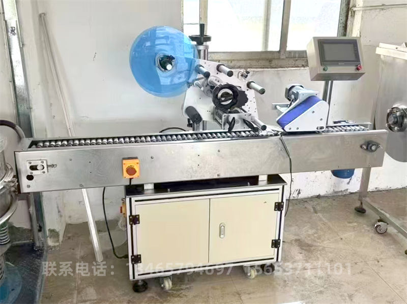 滾輪式平面貼標(biāo)機(jī).jpg